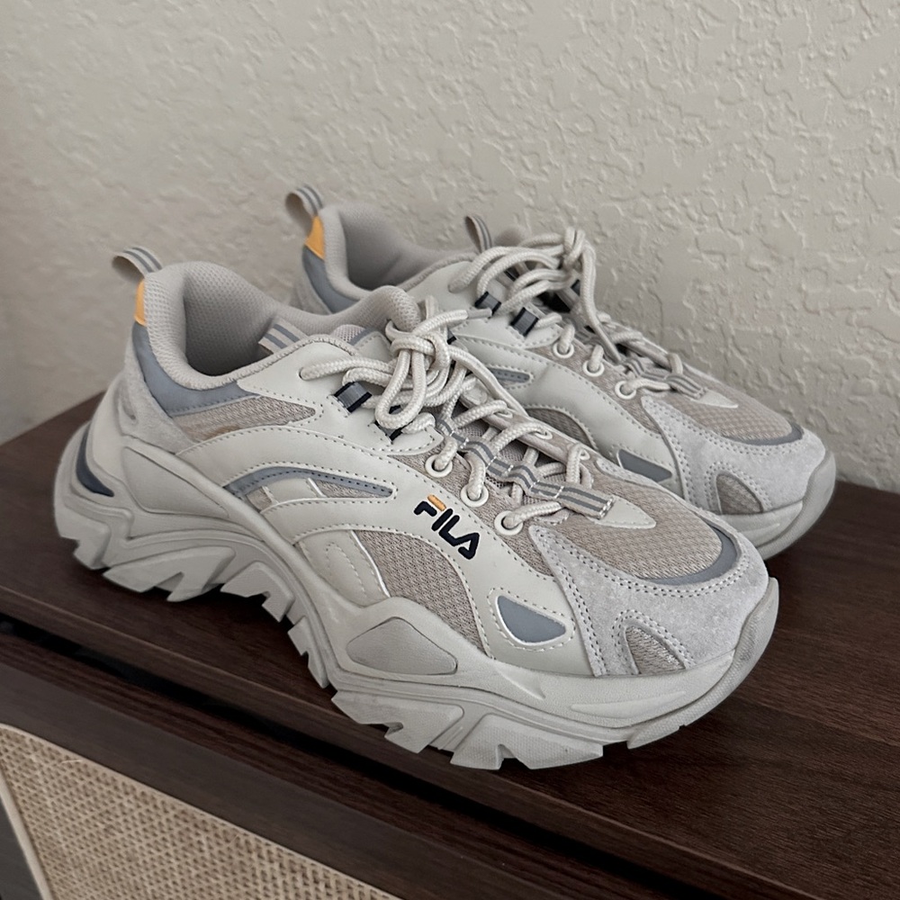 FILA x BTS grey, tan, and white trainers. K-pop sneakers.